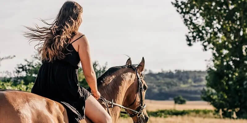 Girl riding a horse