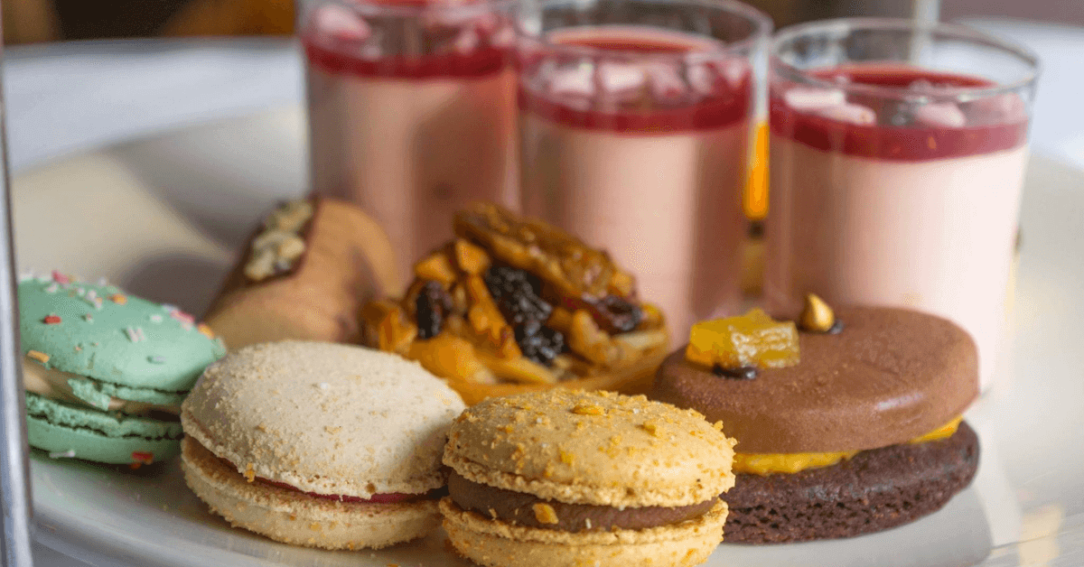 Close up on colourful macarons and sweet foods